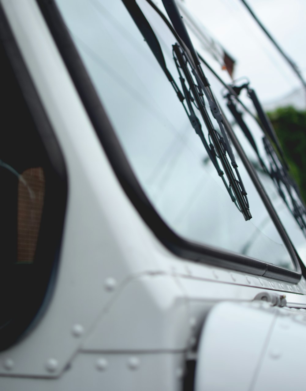 white car with black steering wheel