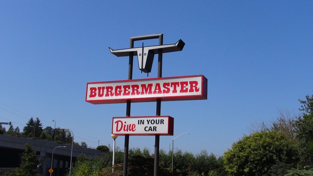 red and white street sign, Burgermaster sign in Seattle USA