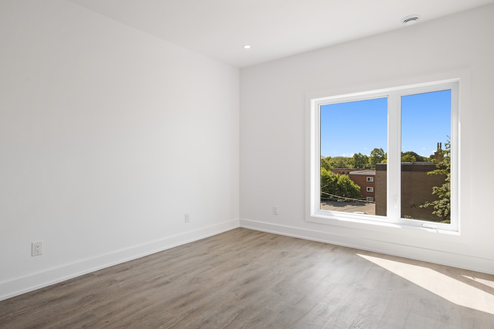 white wall paint room during daytime