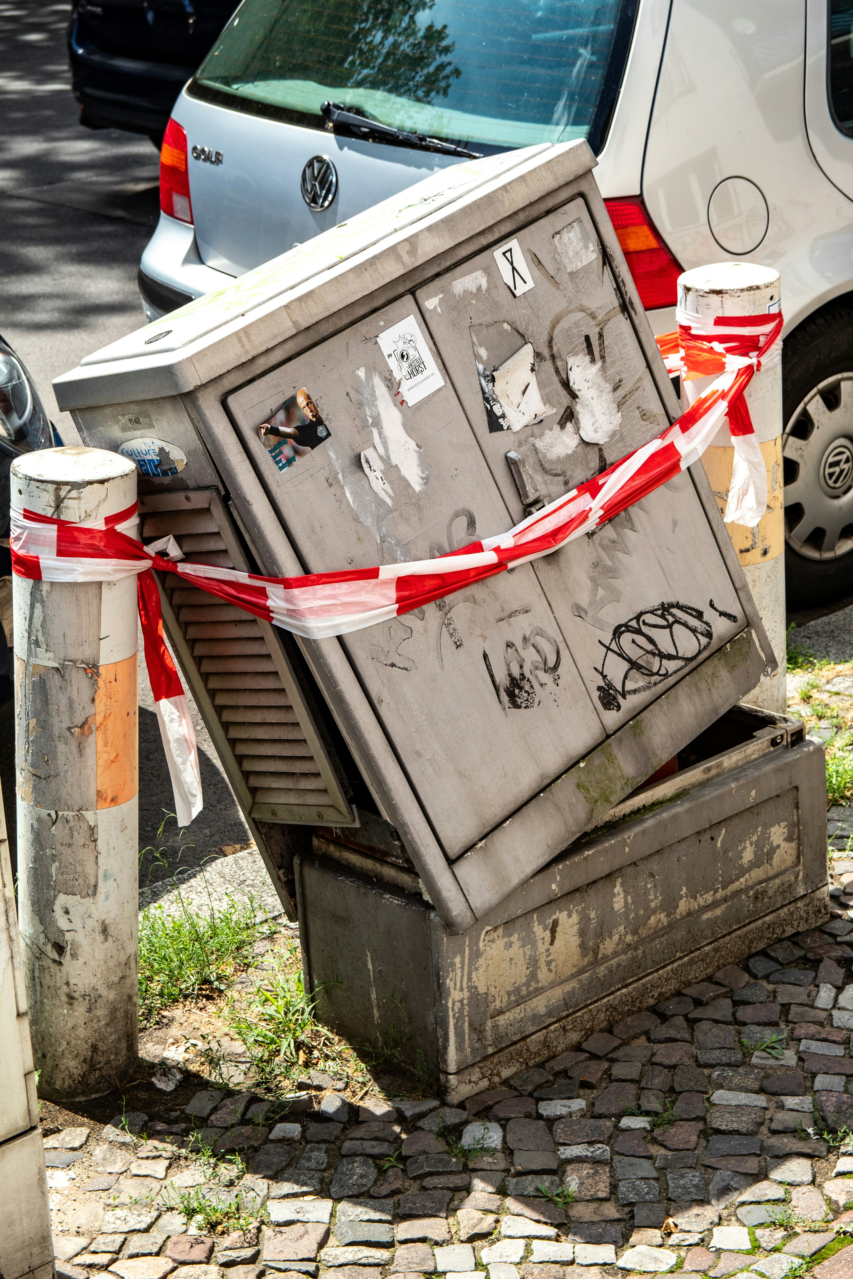 white red and black garbage bin