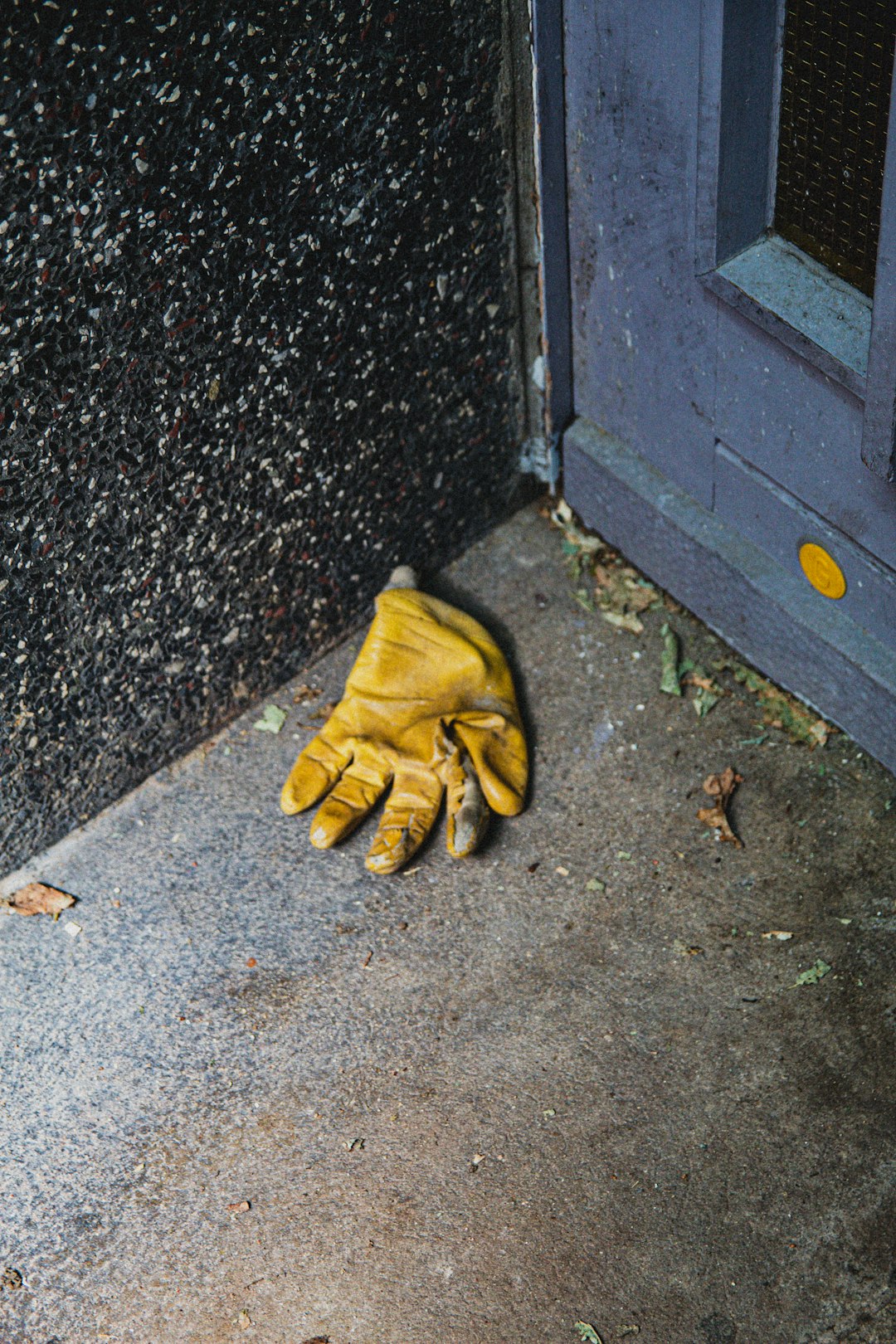 yellow and black hiking shoes on gray concrete floor