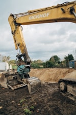 green and yellow heavy equipment