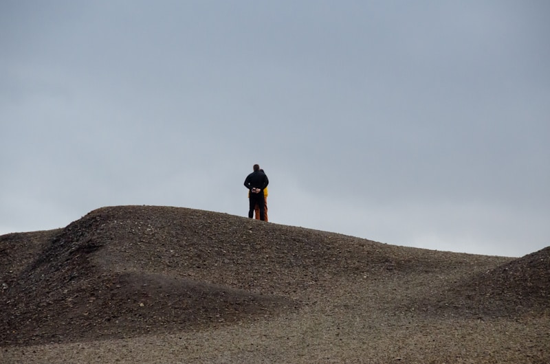 Man on rocky hill