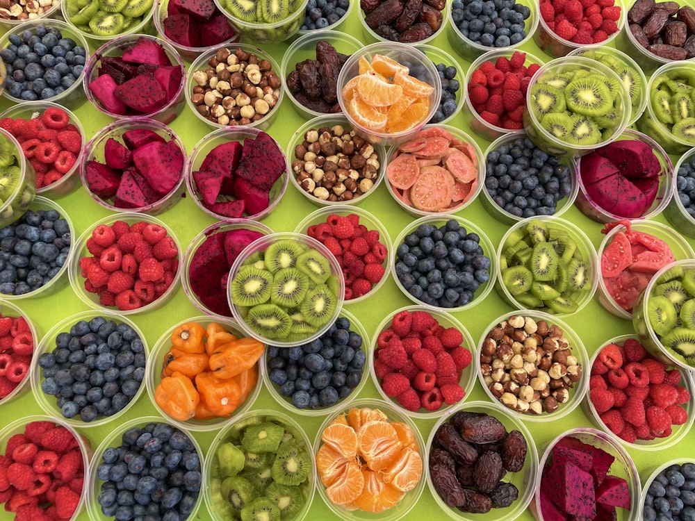 green orange and purple round fruit