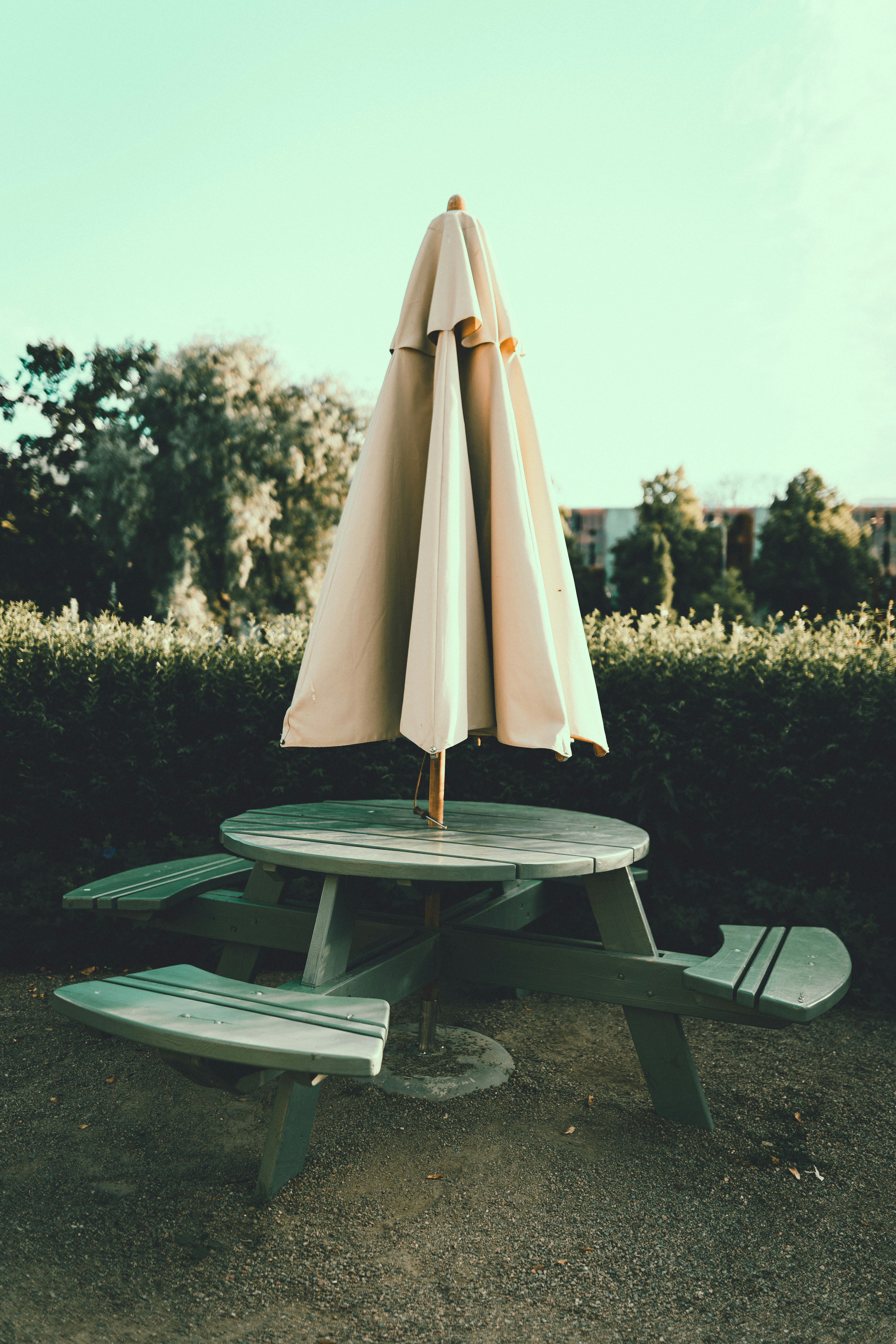 white umbrella on round table