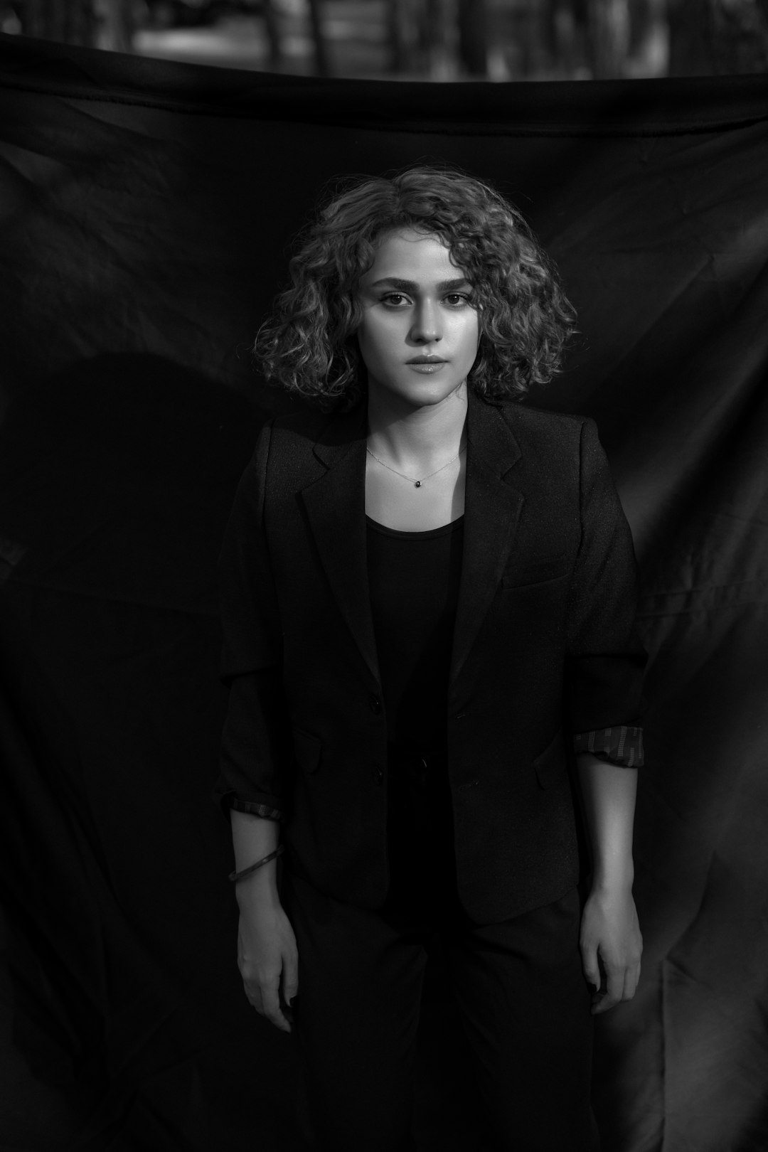 woman in black blazer grayscale photo