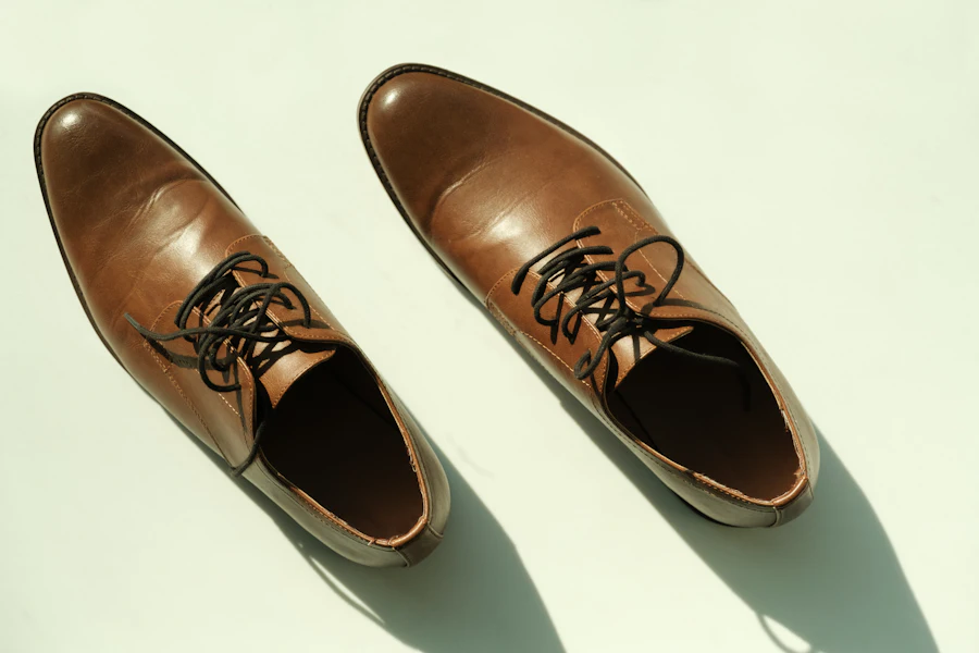 A finished pair of brown leather shoes
