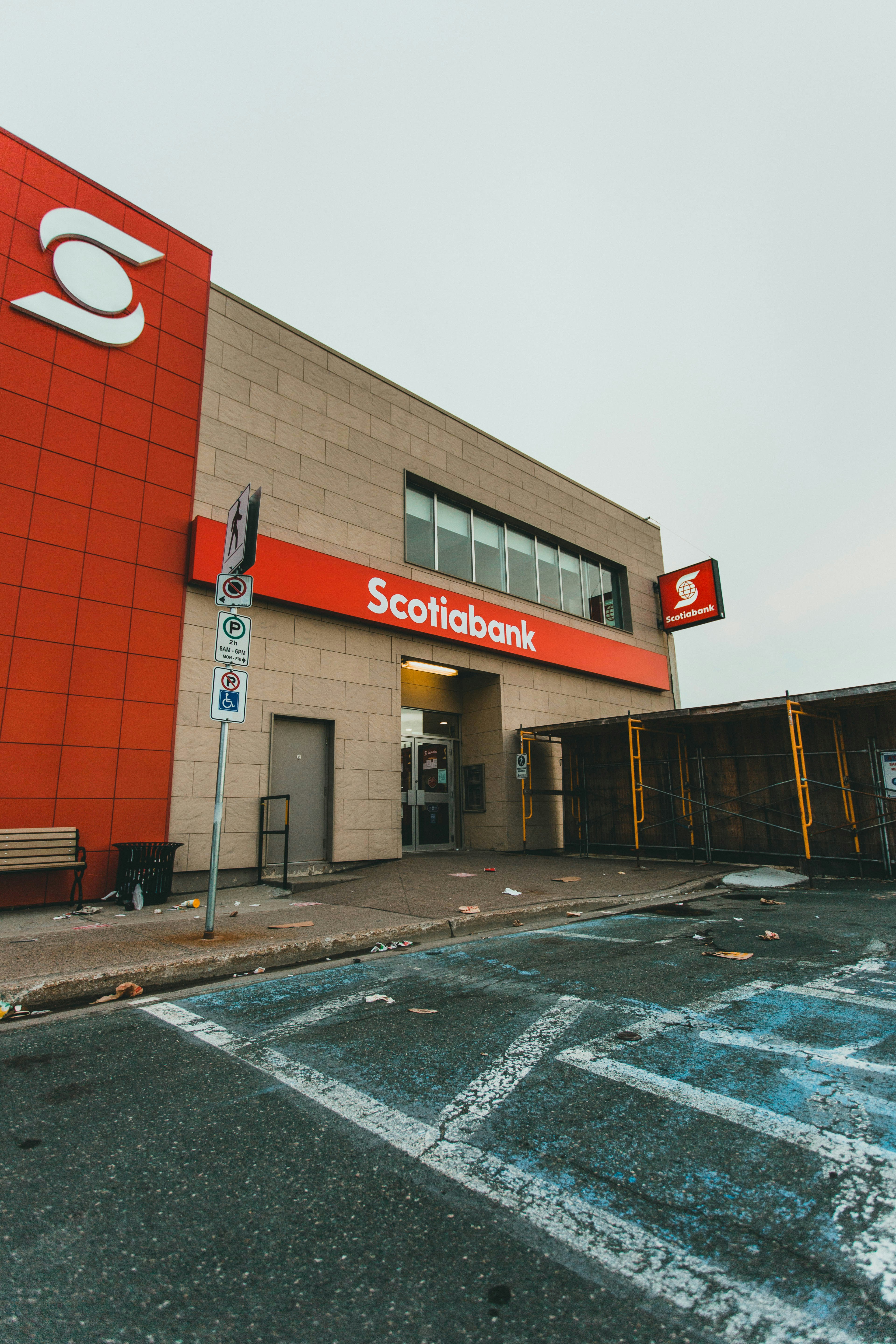 a building with a red and white sign on the front of it