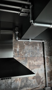Picture of a commercial kitchen chimney duct system in operation.