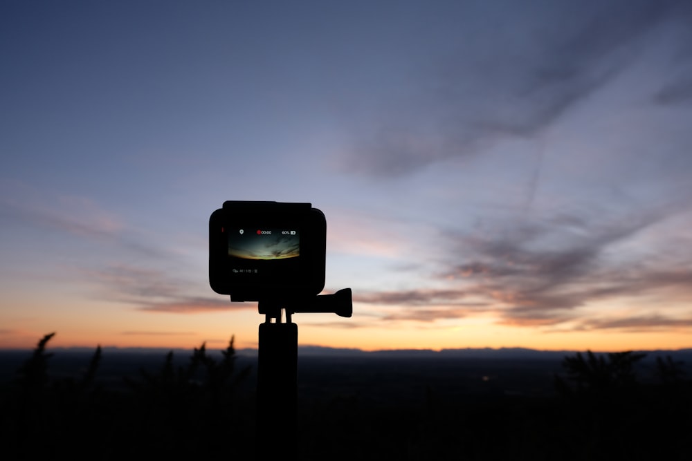 silhouette of camera during sunset