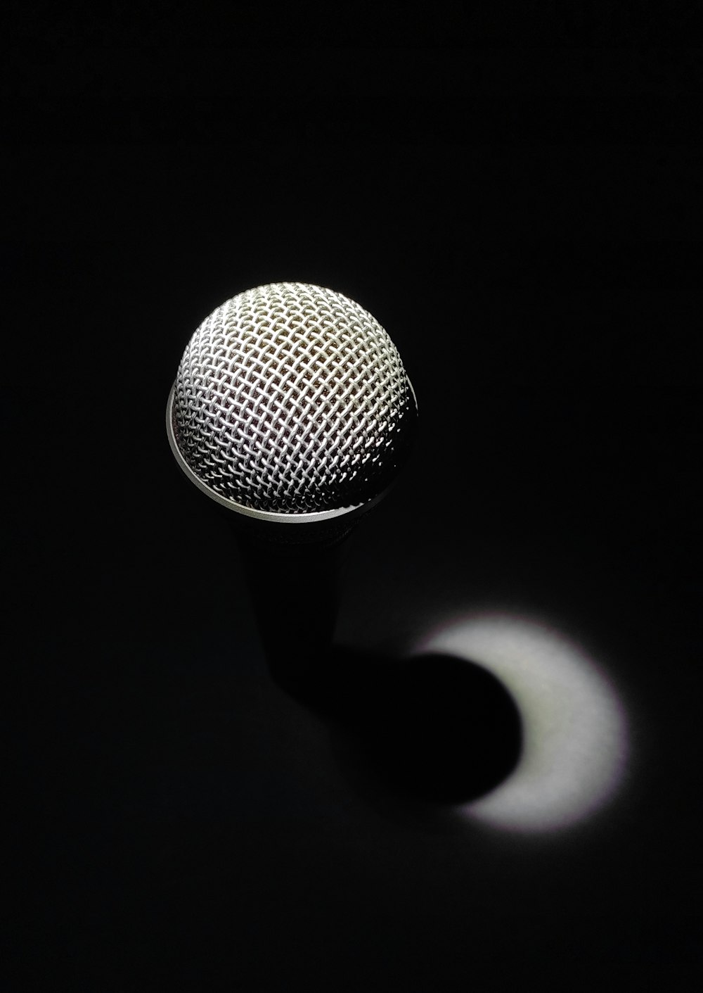 black microphone with black background