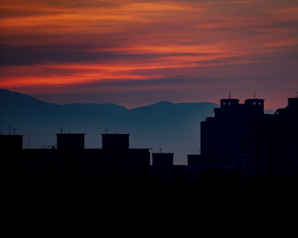 silhouette of building during sunset