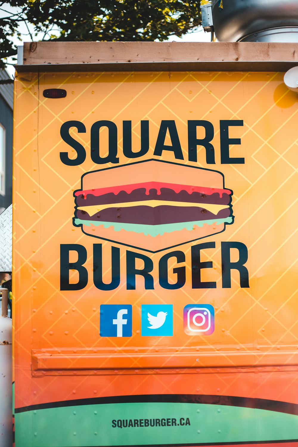 a sign for a restaurant called square burger