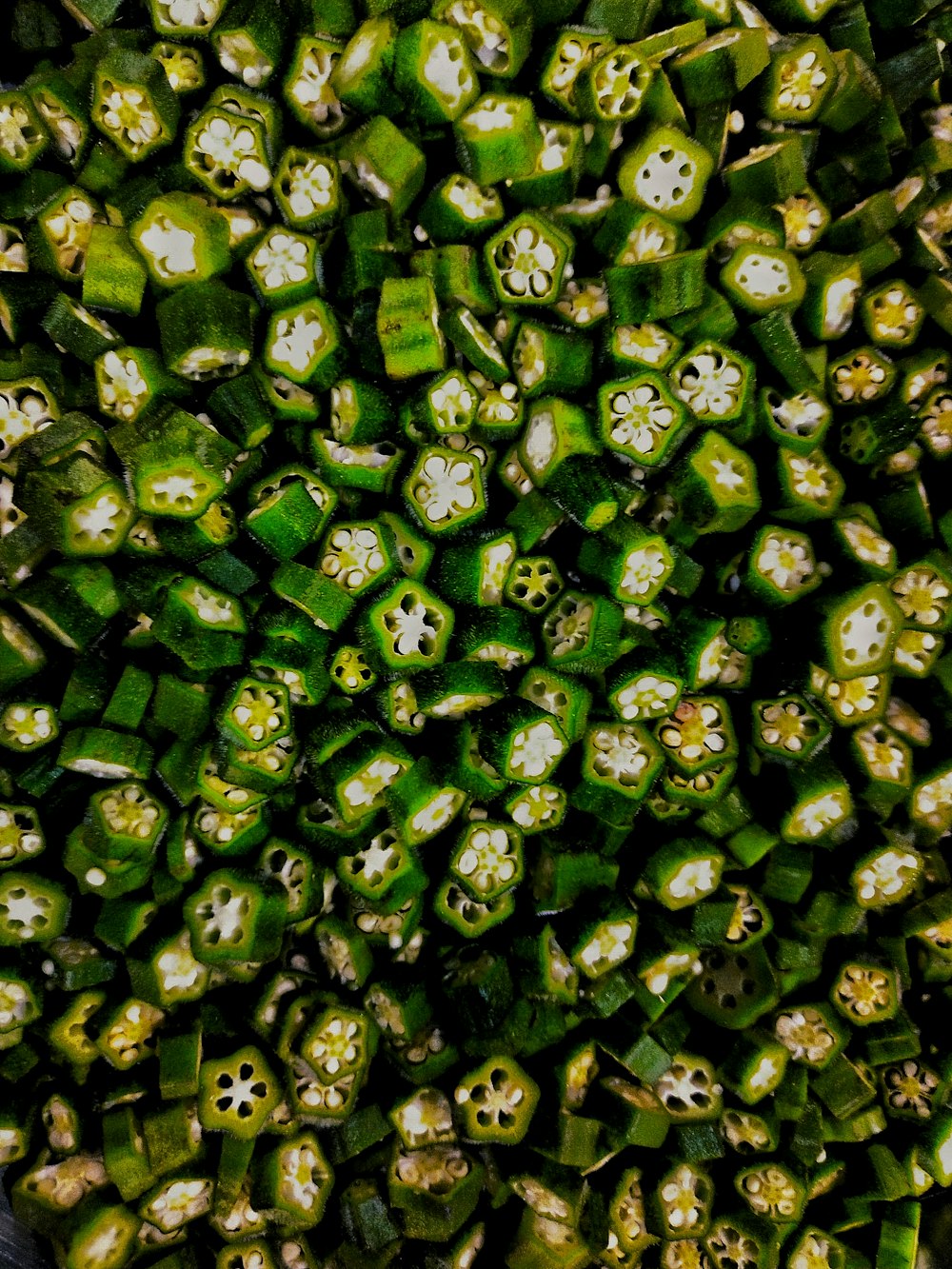 green and black round fruits
