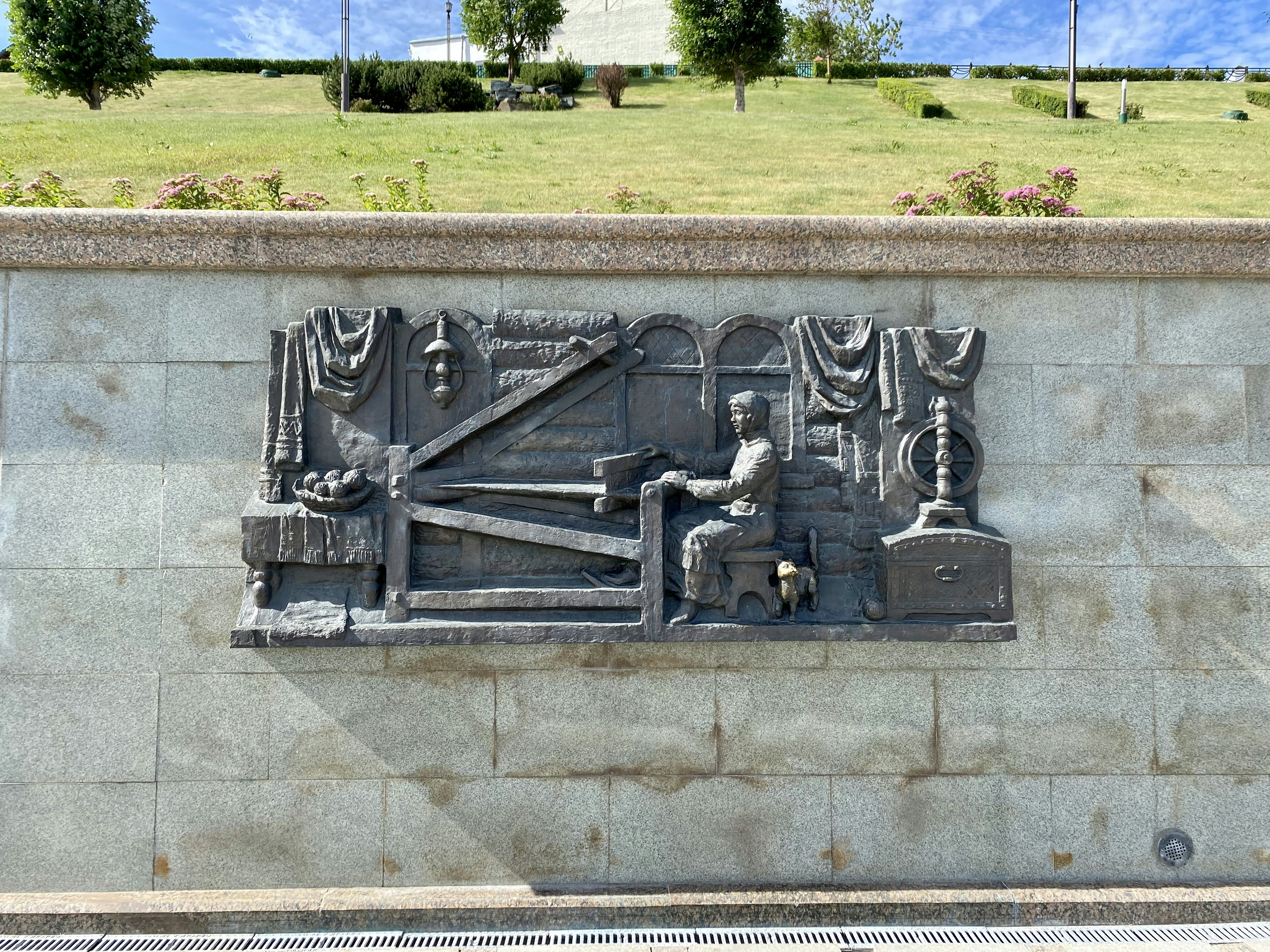 black statue on gray concrete floor