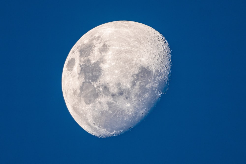 full moon in blue sky