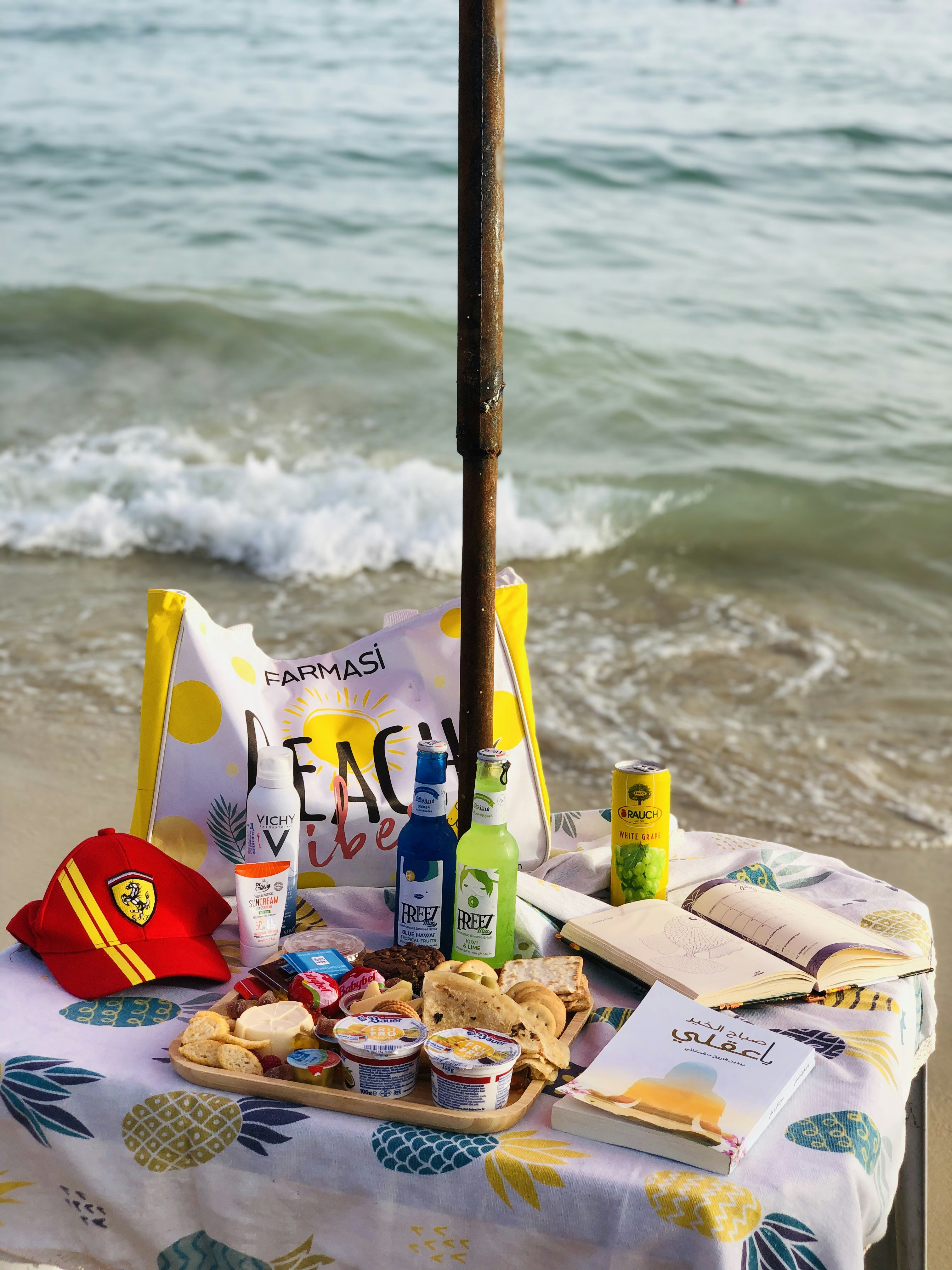 yellow and red plastic toy on yellow and blue textile