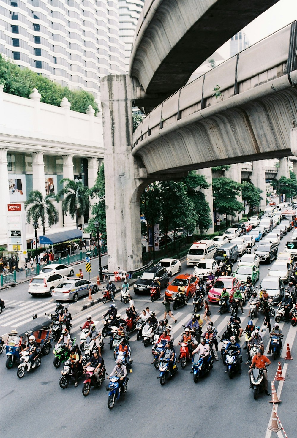 people riding motorcycle on road during daytime