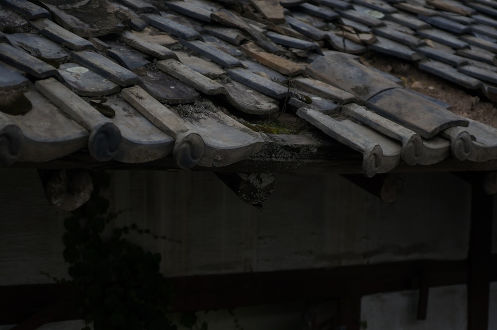 gray roof tiles during daytime