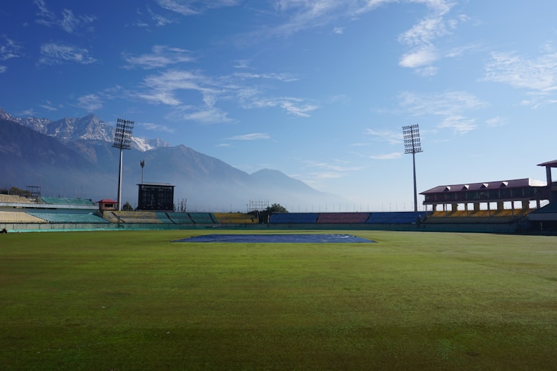 view of HPCA Cricket Stadium in Dharamshala, Himachal Pradesh, with snow-capped Himalayan peaks