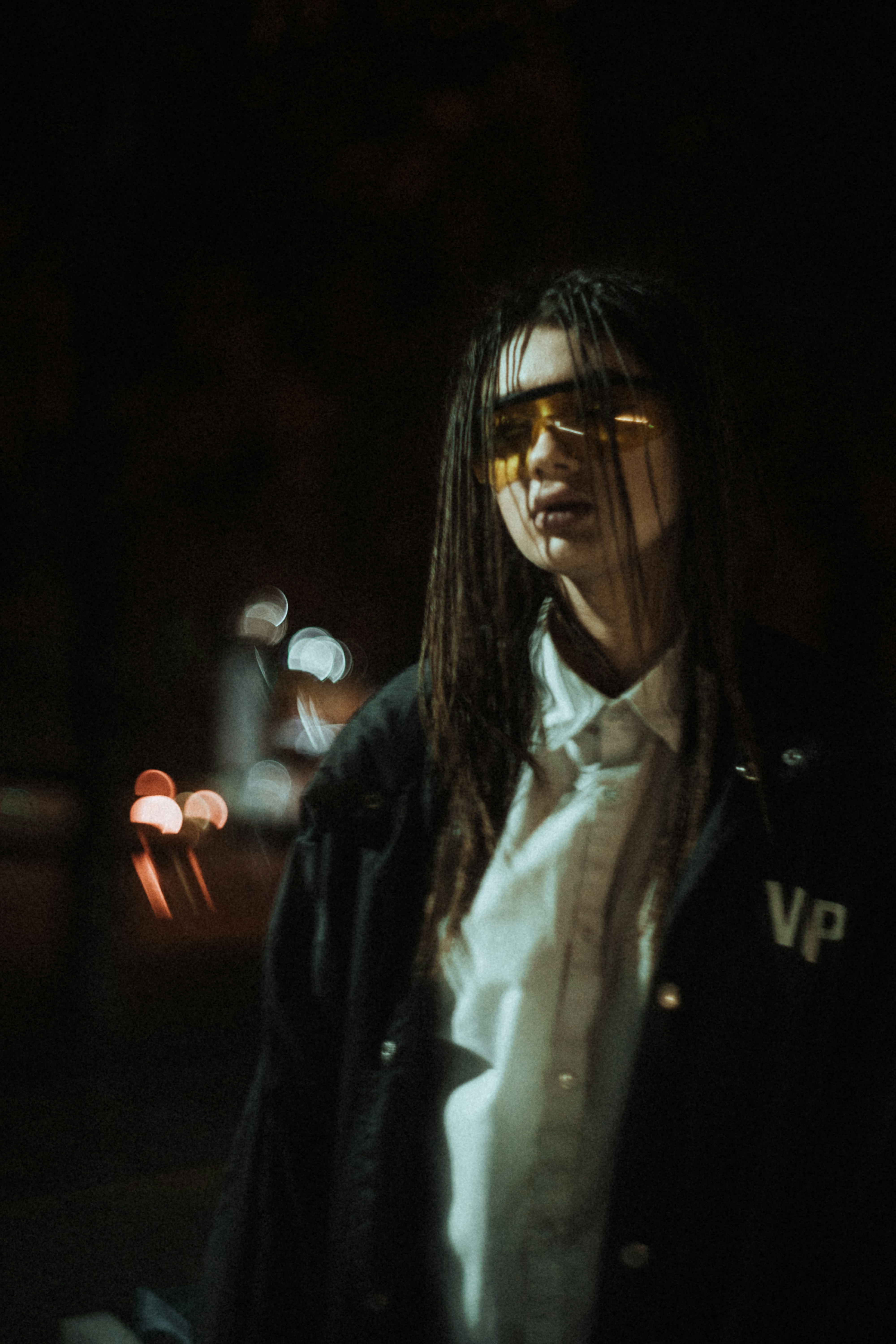 woman in black leather jacket