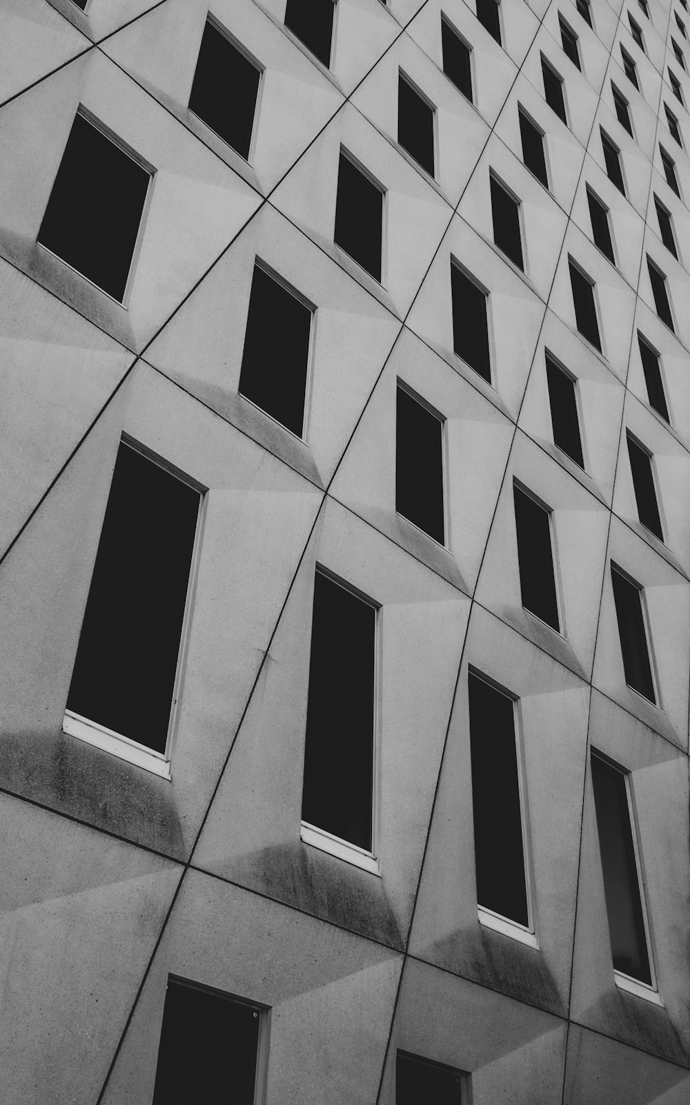 grayscale photo of concrete building