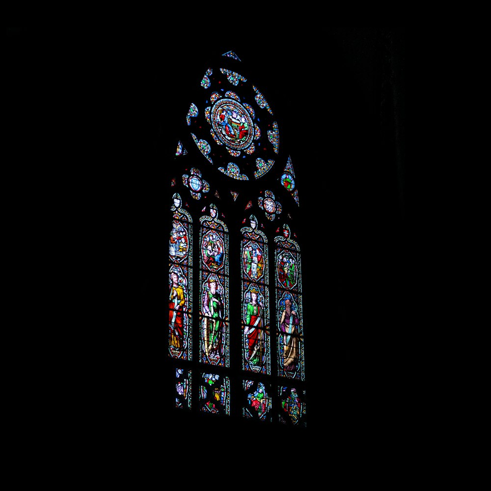 blue green and yellow floral glass window