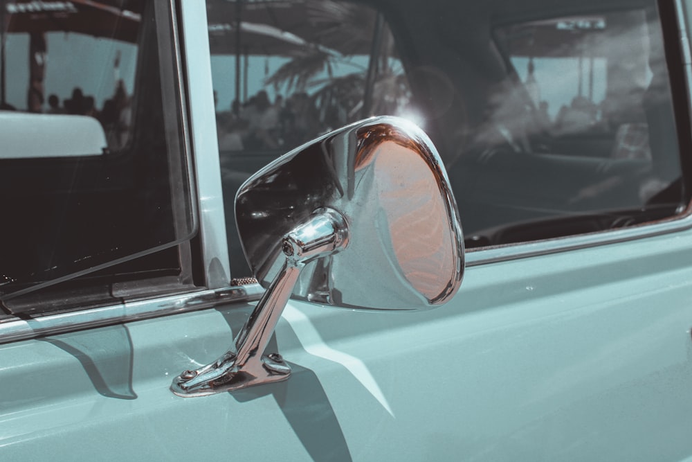 silver car side mirror during daytime