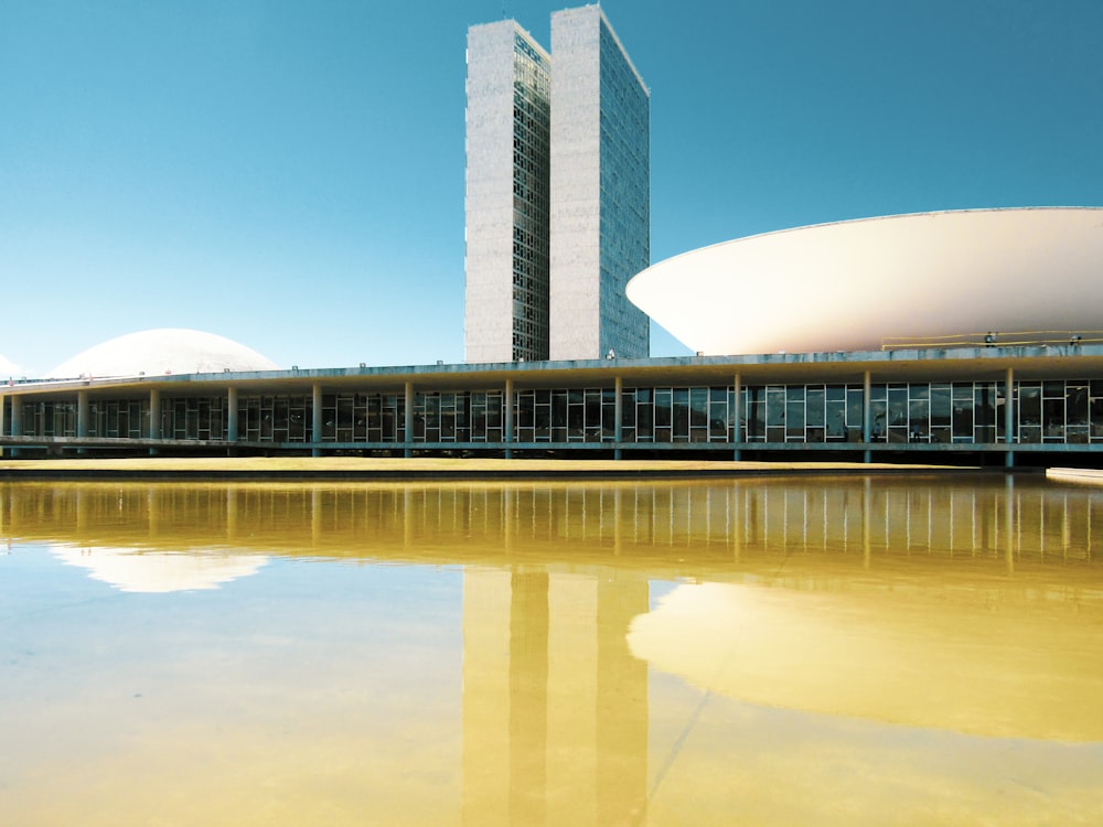 white and brown concrete building under blue sky during daytime