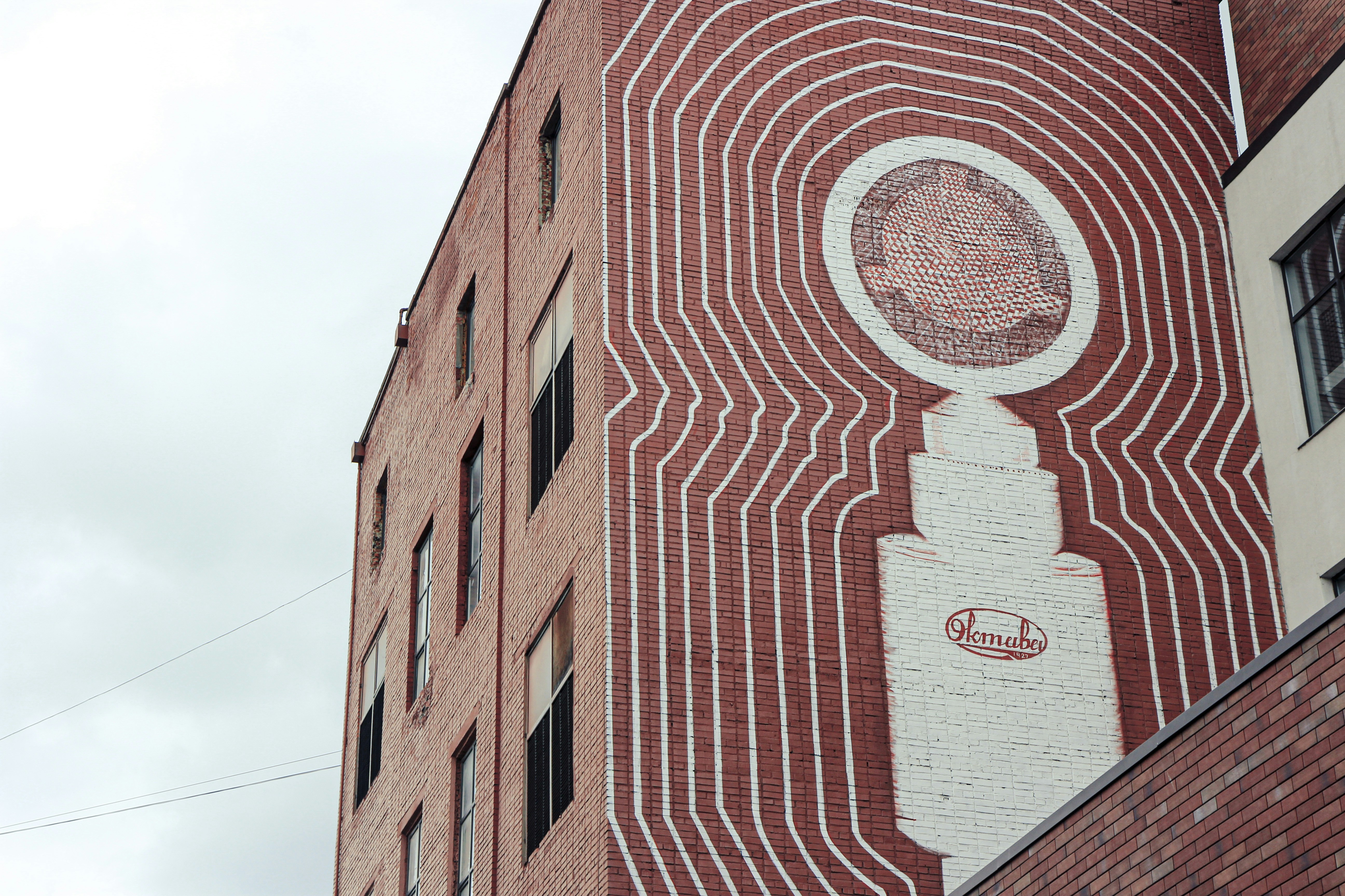 red brick building under white sky during daytime