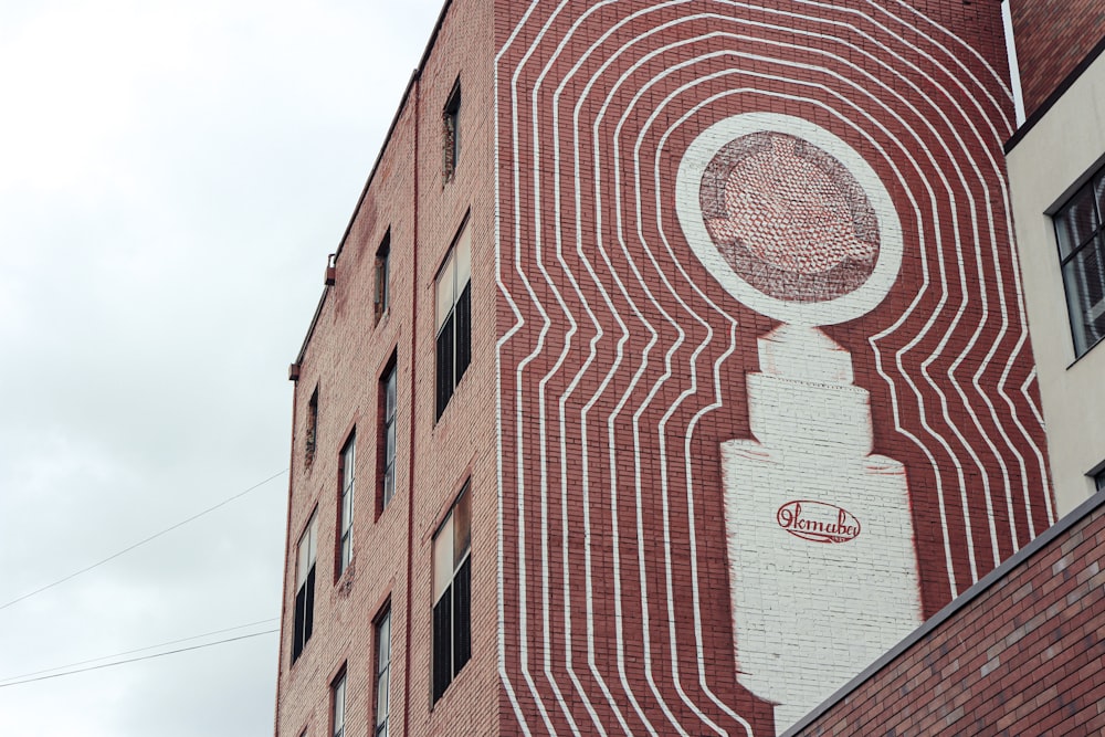 red brick building under white sky during daytime