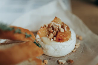 white and brown bread with white cream on top