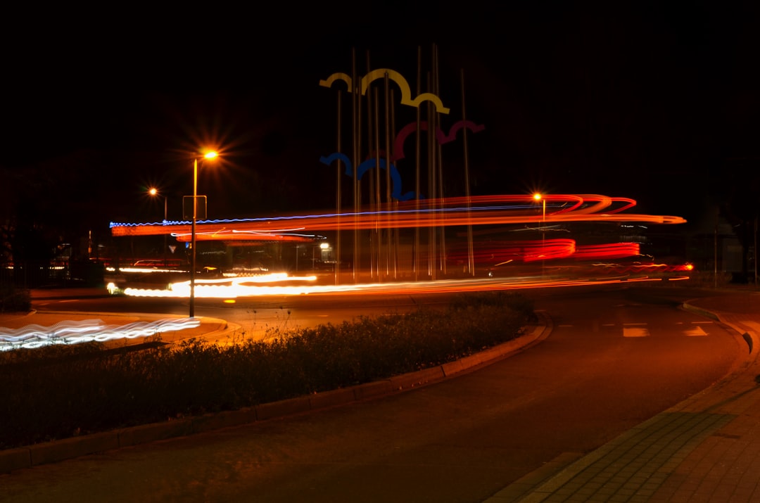 time lapse photography of cars on road during night time