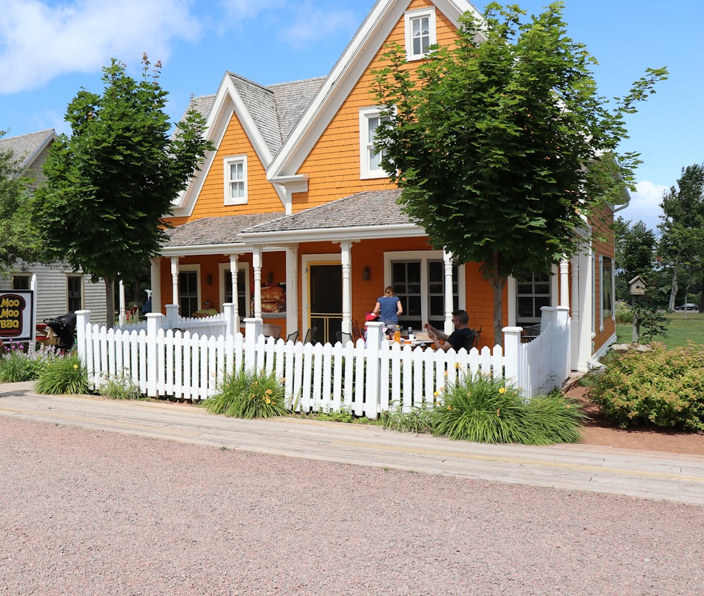 white and brown wooden house