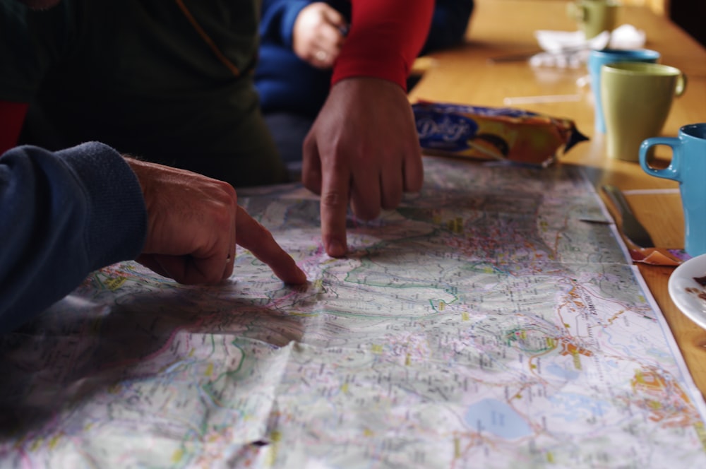 two people looking at a map