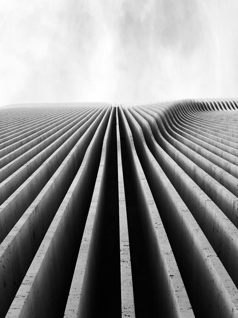 grayscale photo of concrete building