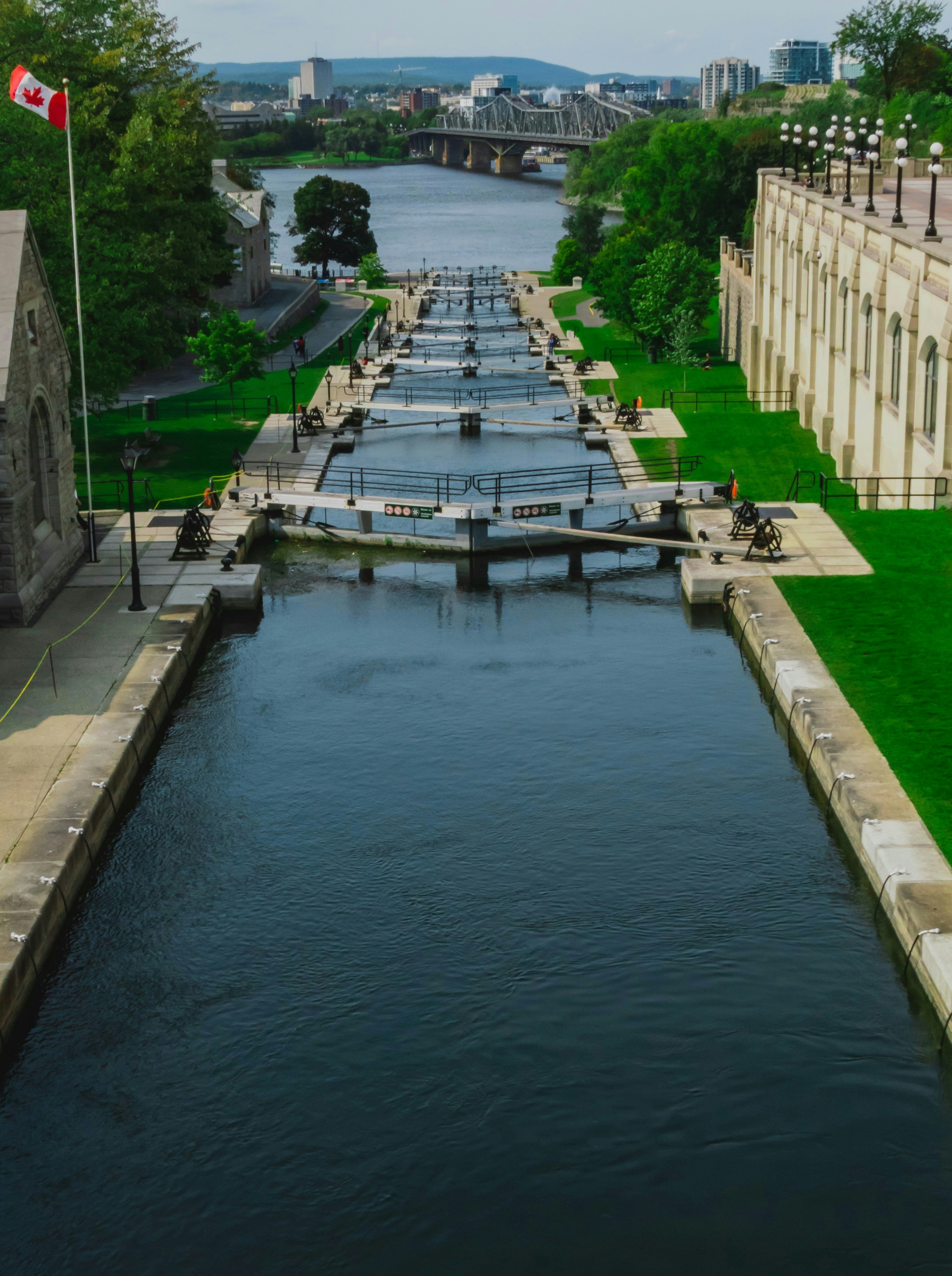 body of water near white concrete building during daytime