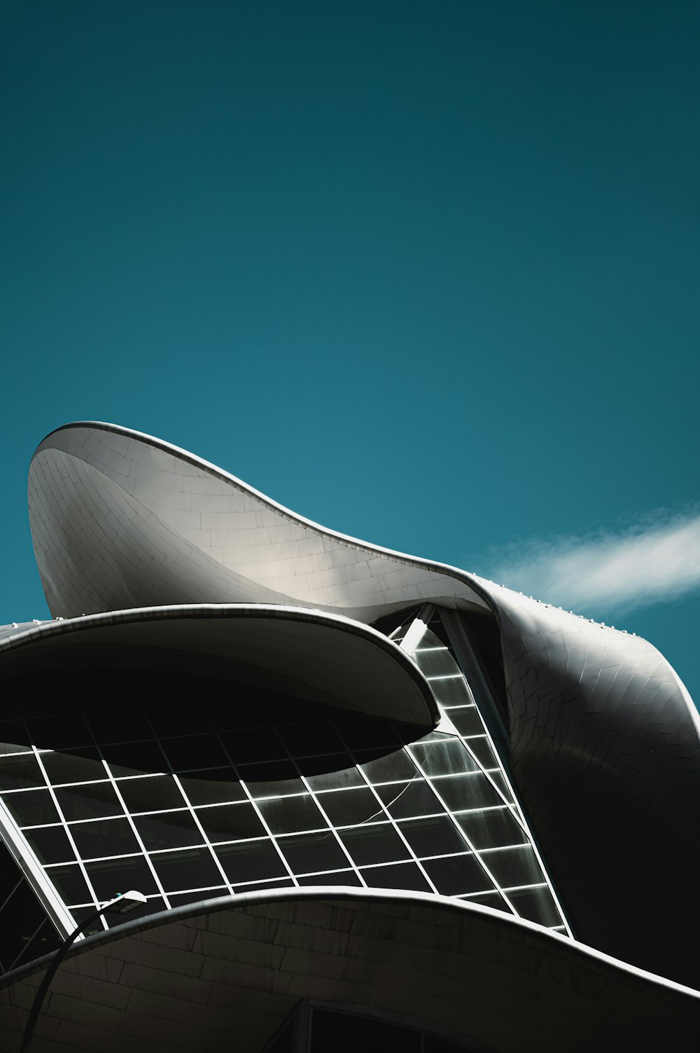 white and black building under blue sky during daytime