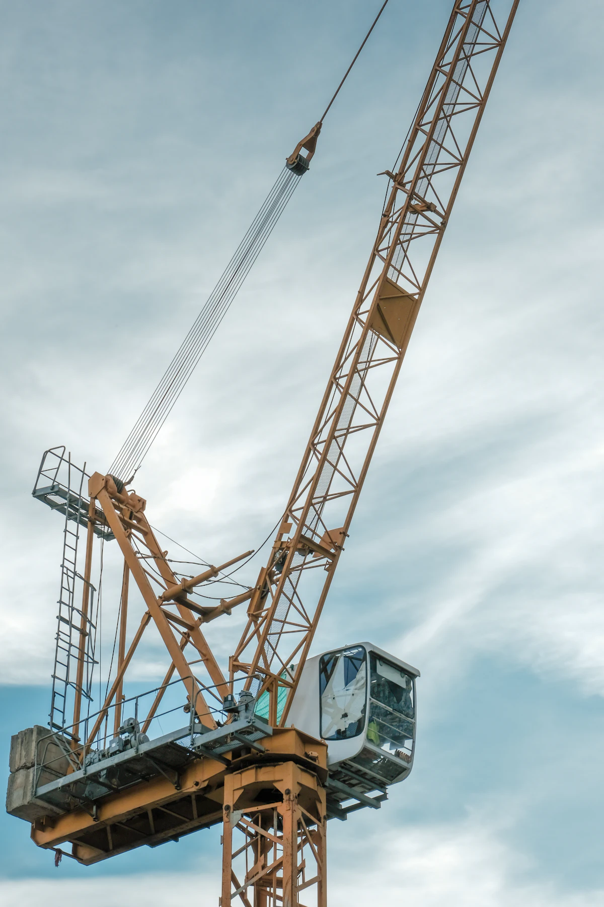 A tower crane against the sky