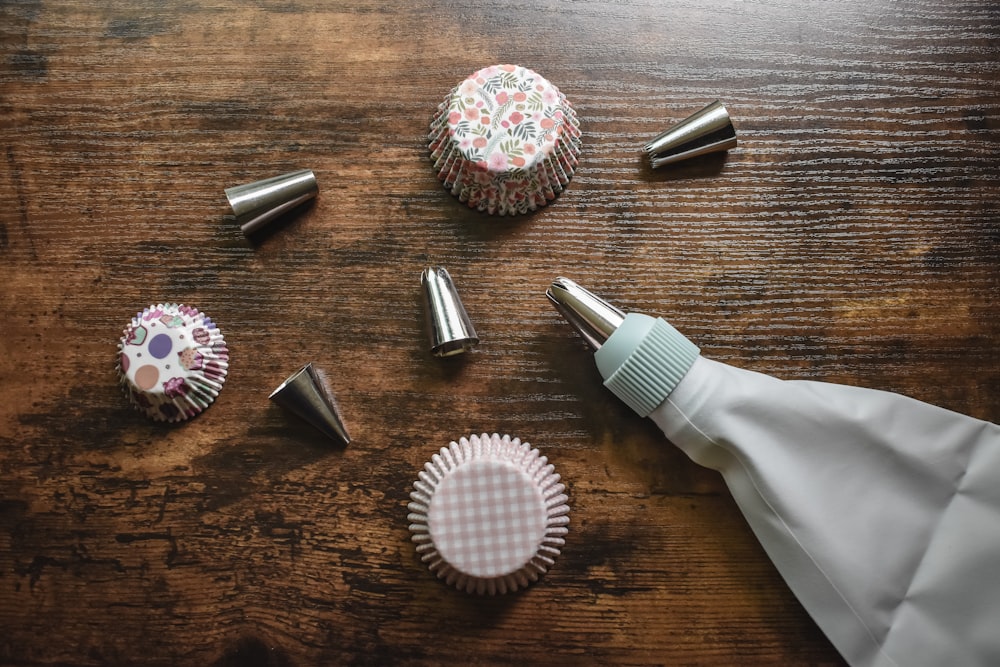 white and silver hair brush