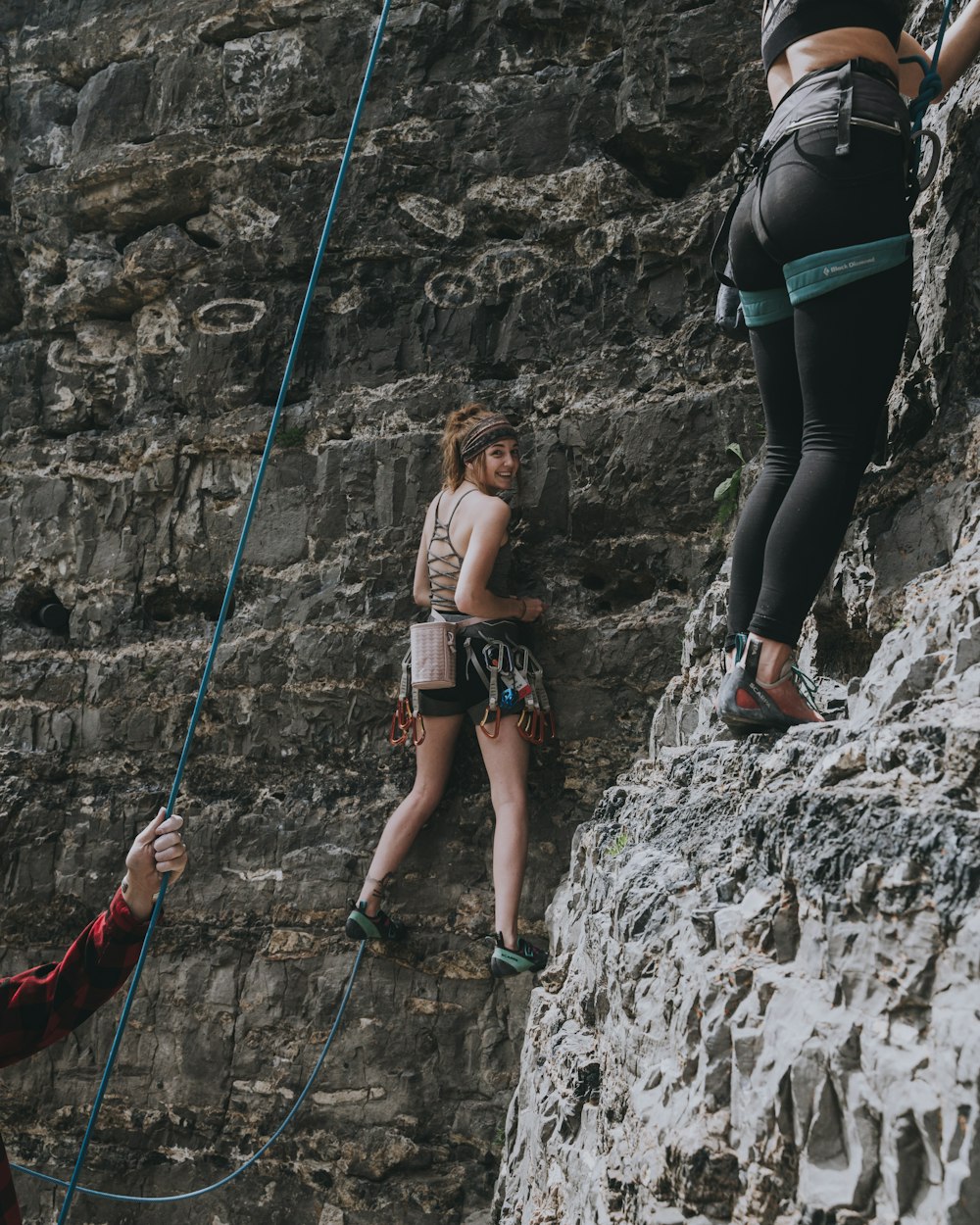 Woman in black sports bra and black leggings climbing on rocky mountain  during daytime photo – Free Utah hiking trails Image on Unsplash