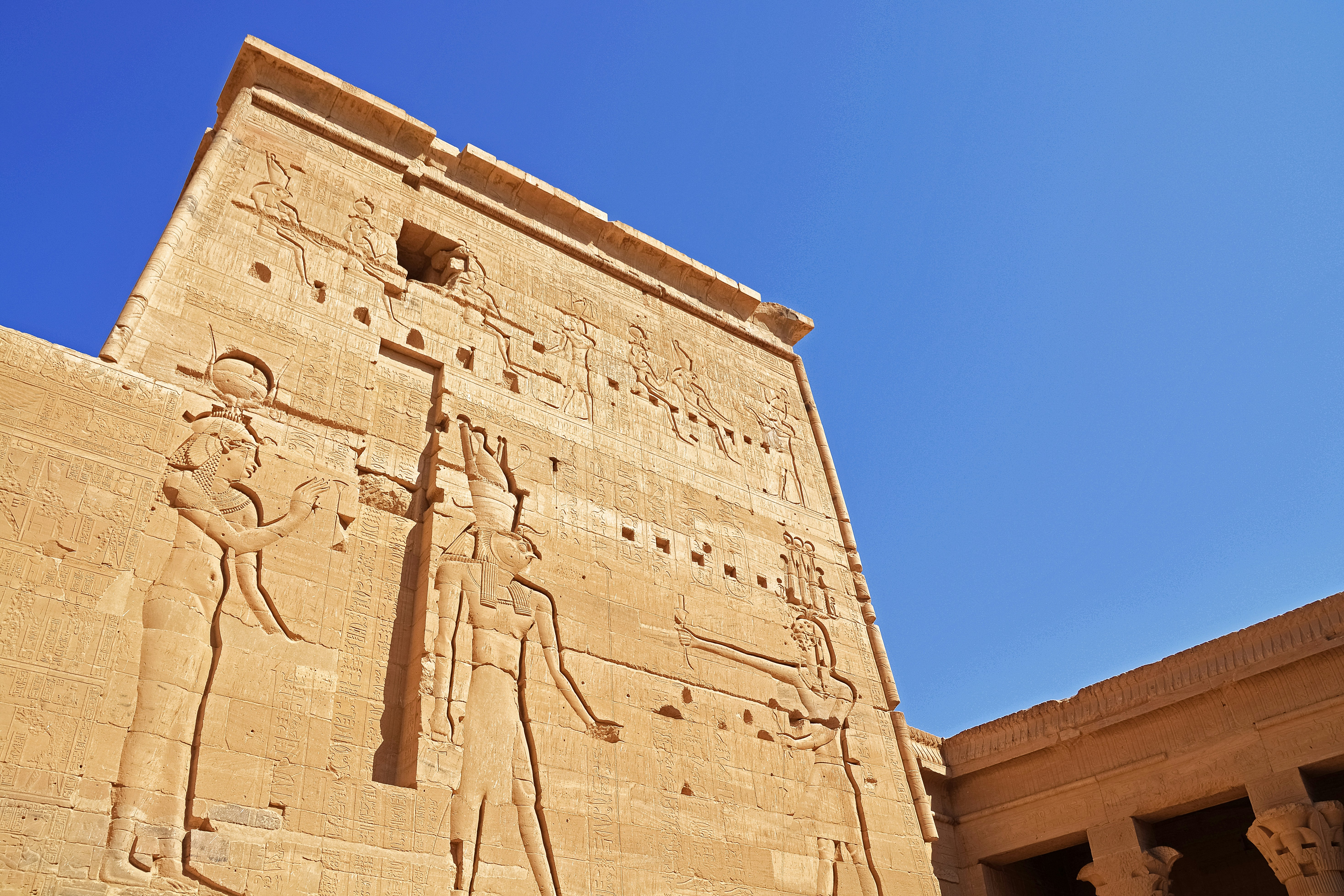 brown concrete building under blue sky during daytime