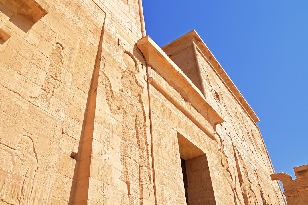 brown concrete building under blue sky during daytime