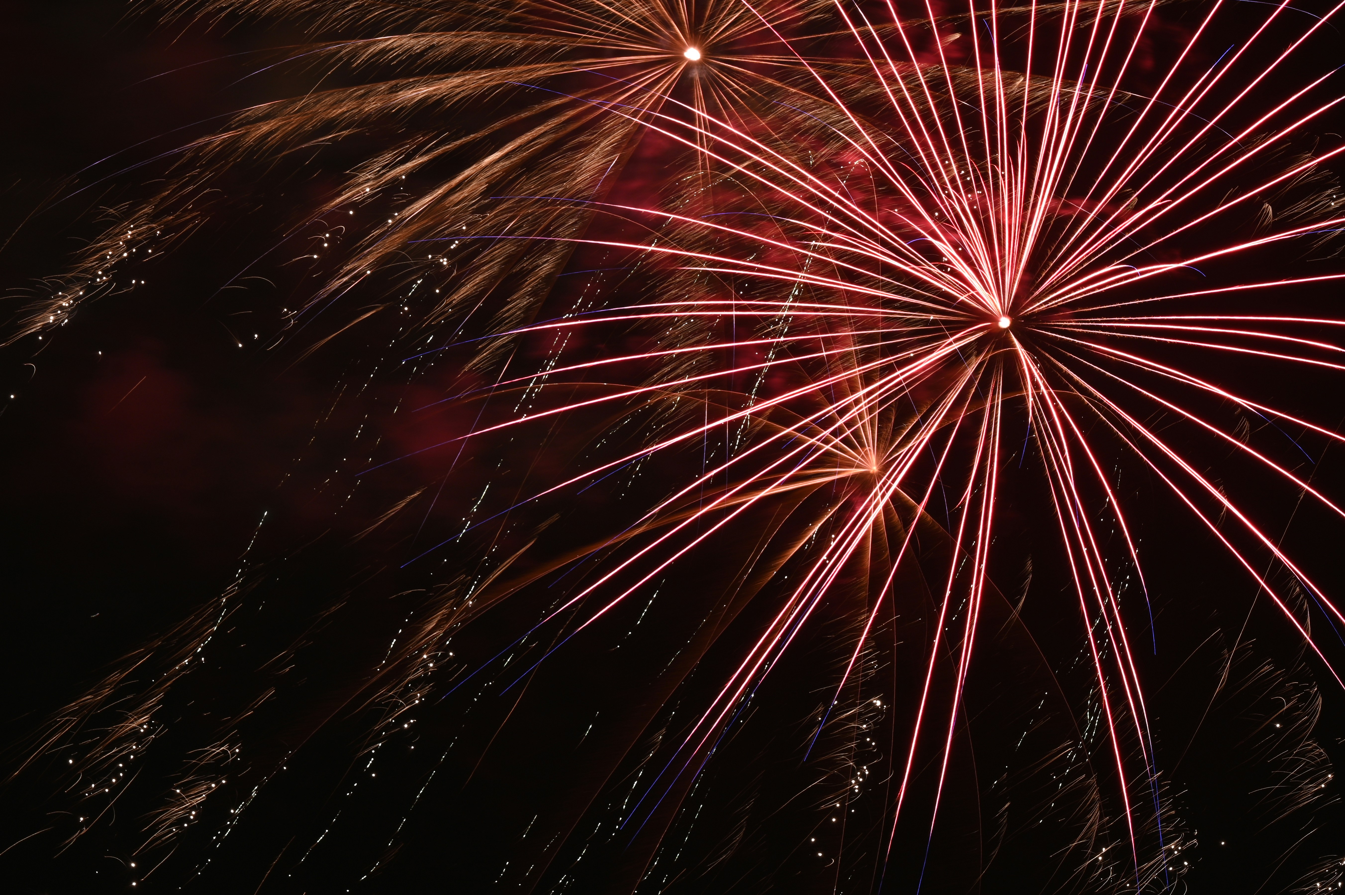 red and yellow fireworks during night time