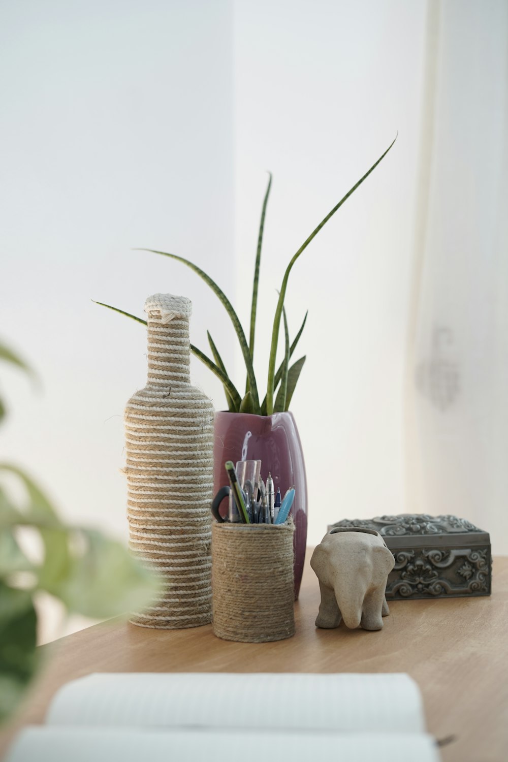 brown wicker vase on brown wooden table