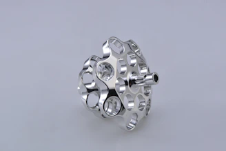 silver and black round accessory