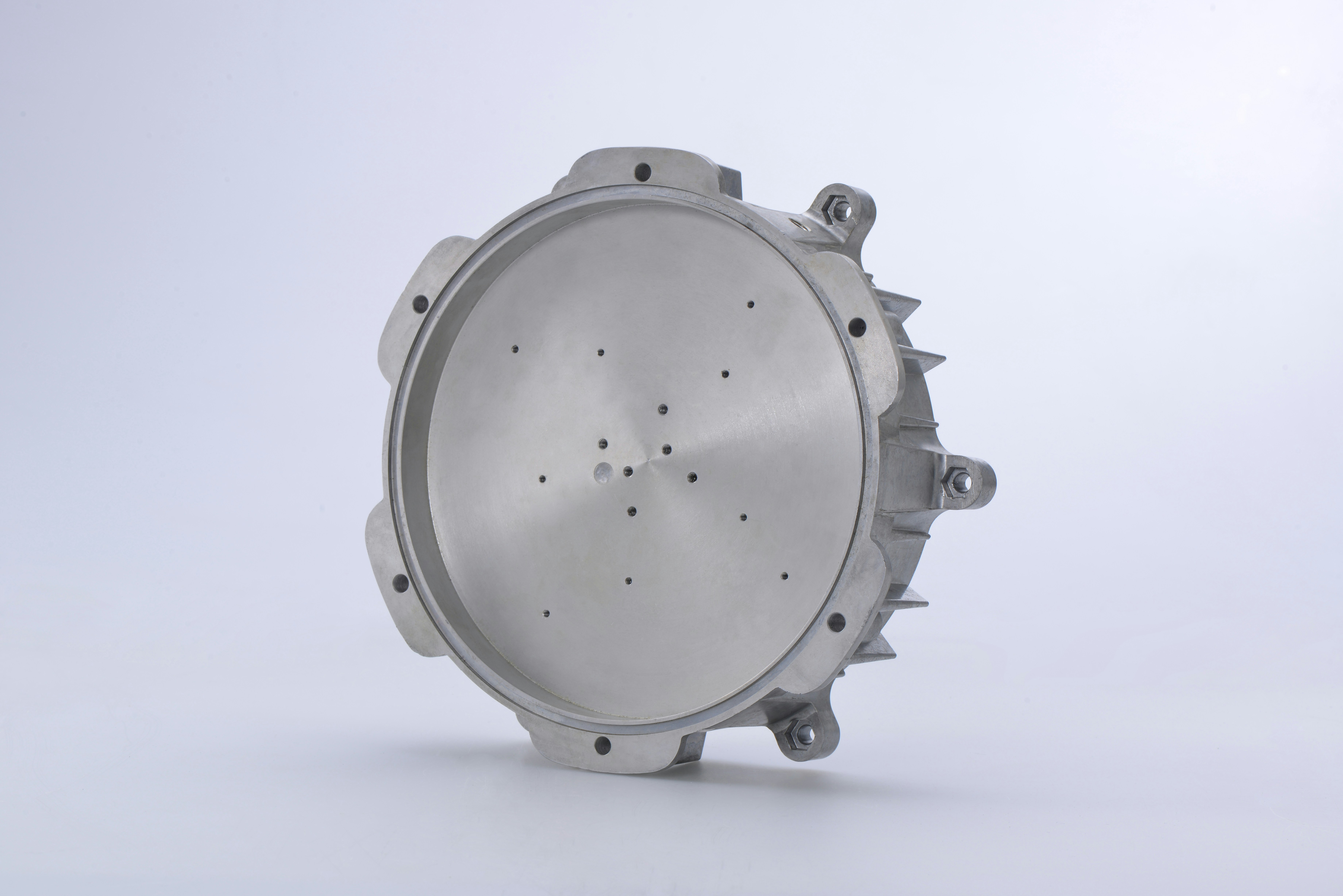 silver round watch on white surface