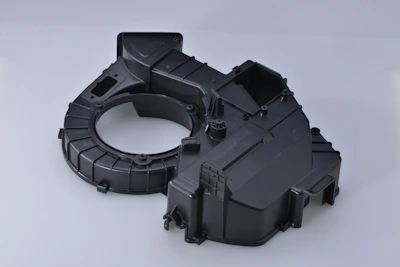 black plastic toy on white surface