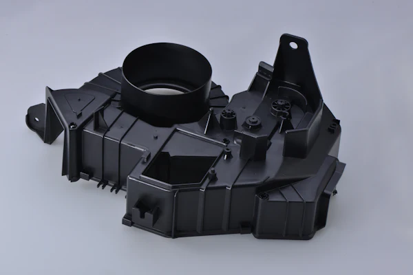 Molded robotics housing and bracket cluster