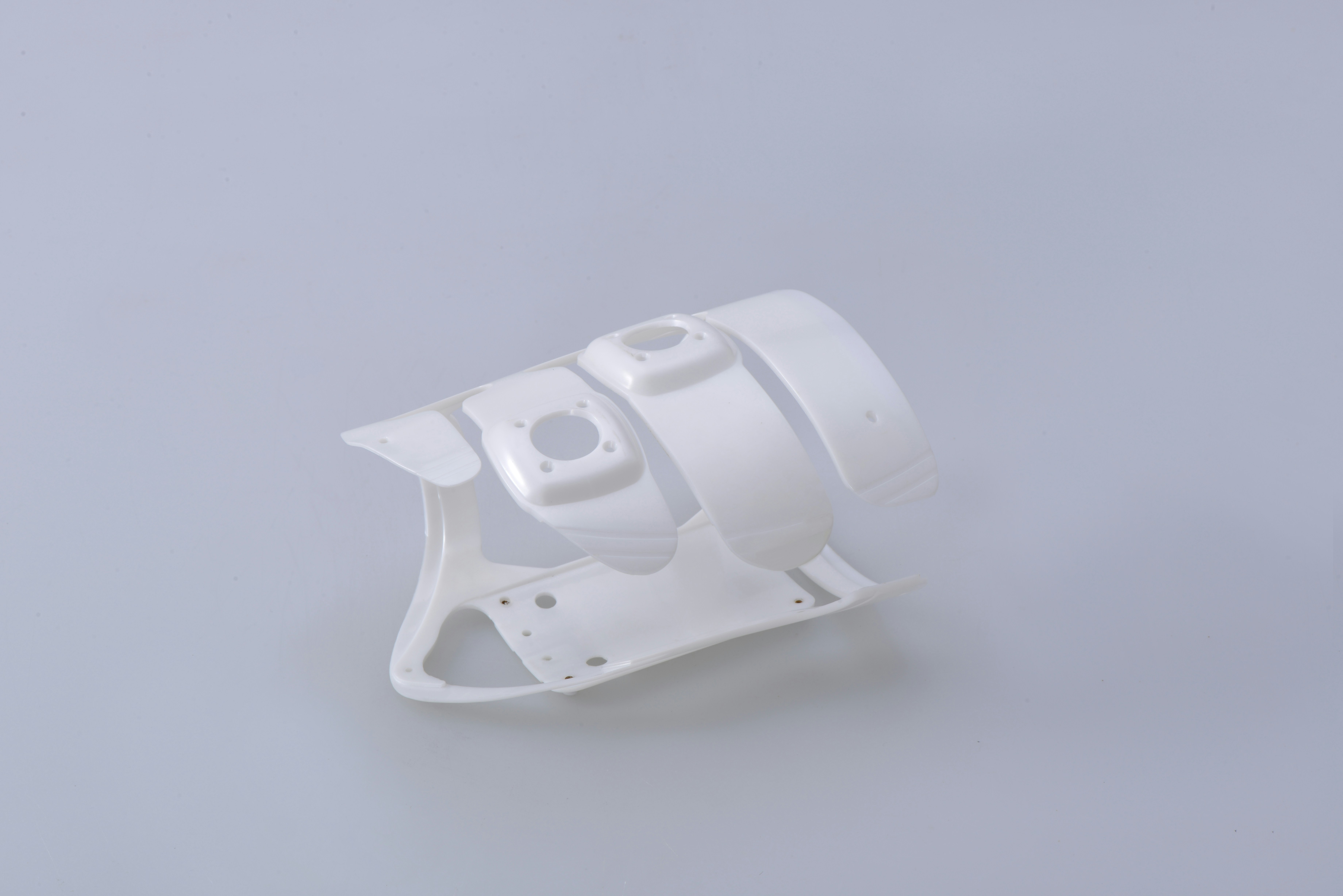 white plastic frame on white surface